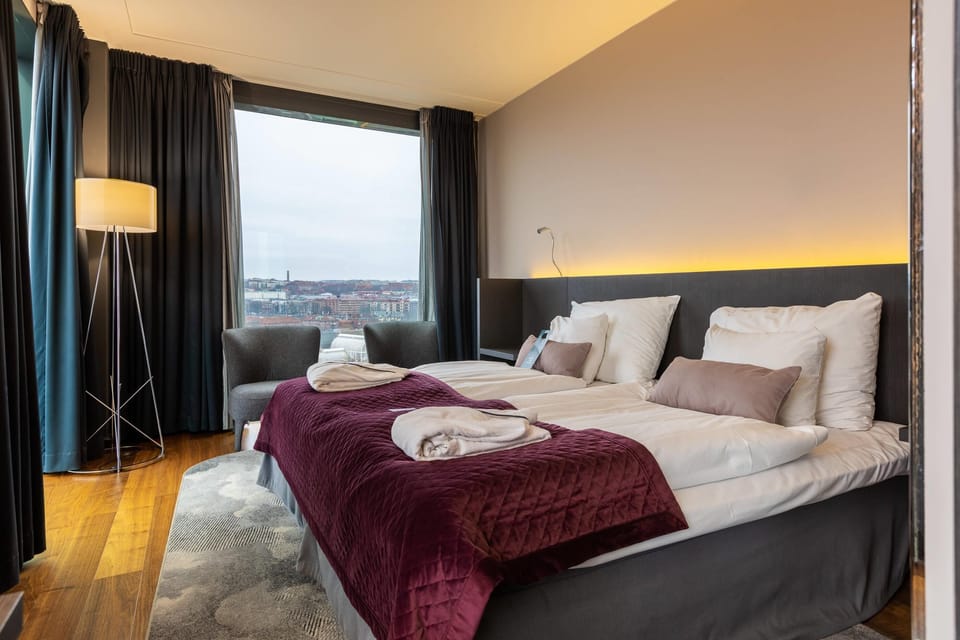 Double Room - City View | Down comforters, minibar, desk, laptop workspace