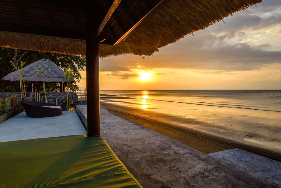 On the beach, black sand