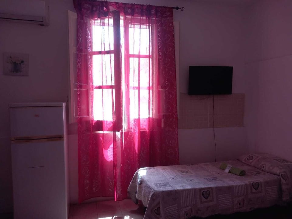 Classic Quadruple Room, 1 Bedroom | Desk, laptop workspace, free WiFi