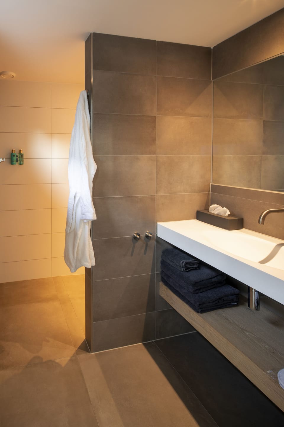 Deluxe Studio | Bathroom | Shower, rainfall showerhead, designer toiletries, hair dryer