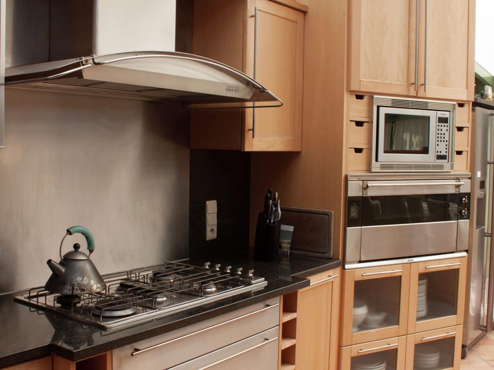 Villa | Private kitchen | Microwave, stovetop, dishwasher, highchair