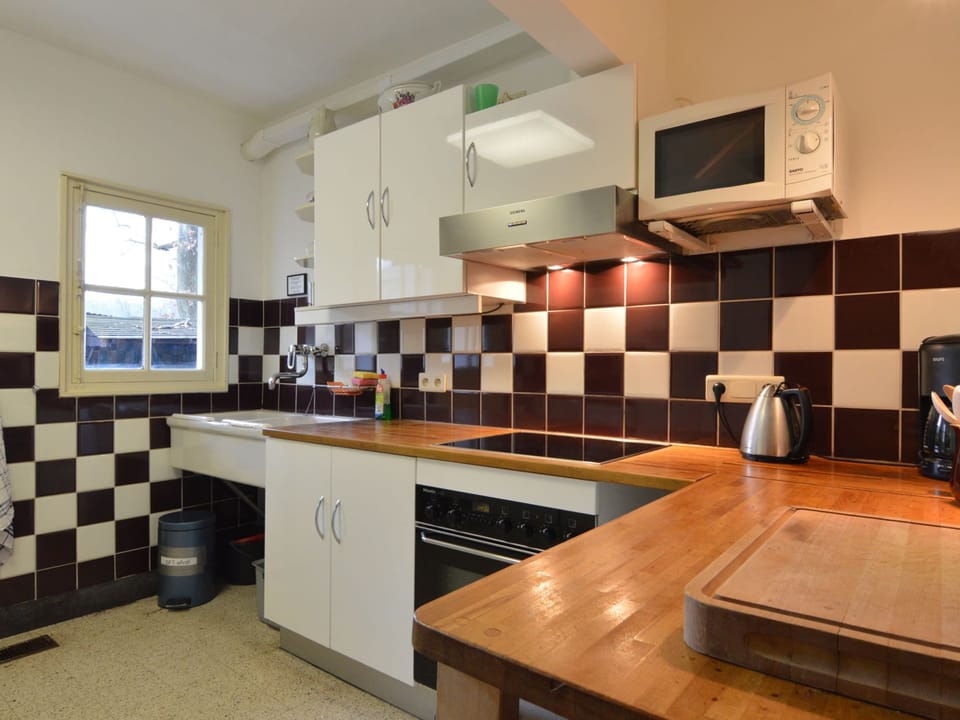 Villa | Private kitchen | Microwave, dishwasher, coffee/tea maker, highchair