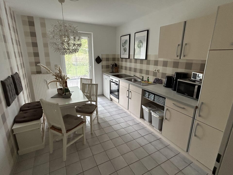 Apartment | Private kitchen | Stovetop, highchair