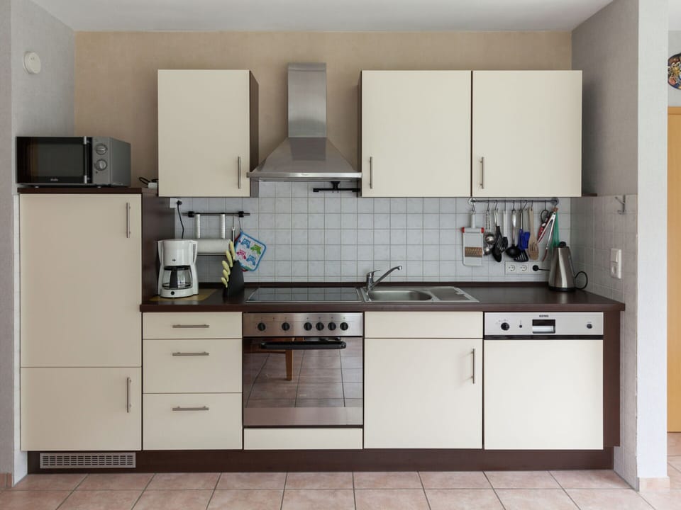 Apartment | Private kitchen | Stovetop, dishwasher, highchair