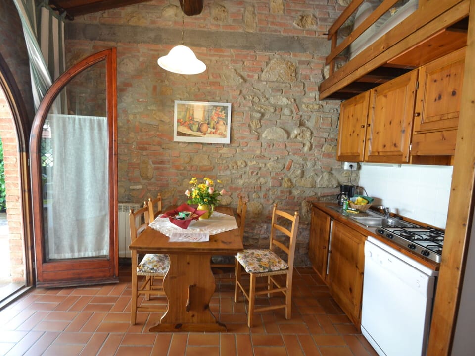 Apartment | Private kitchen | Stovetop, highchair