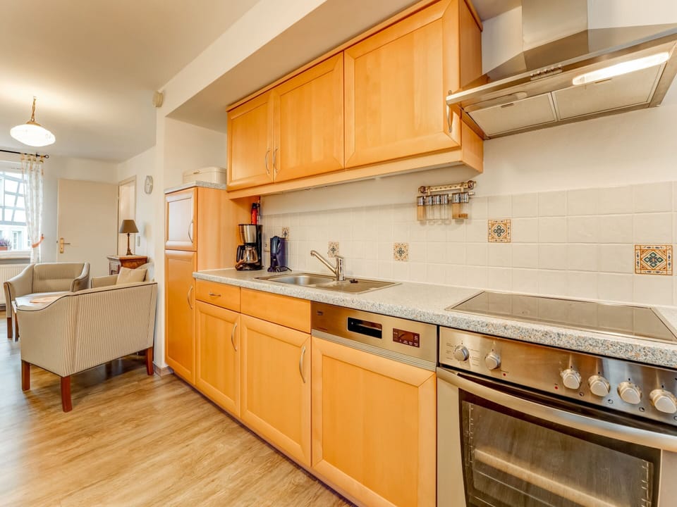 Apartment | Private kitchen | Fridge, highchair