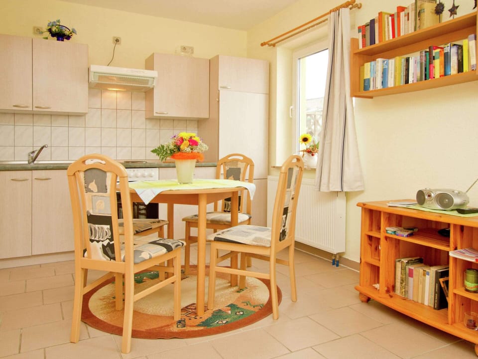 Apartment | Private kitchen | Stovetop, electric kettle, highchair