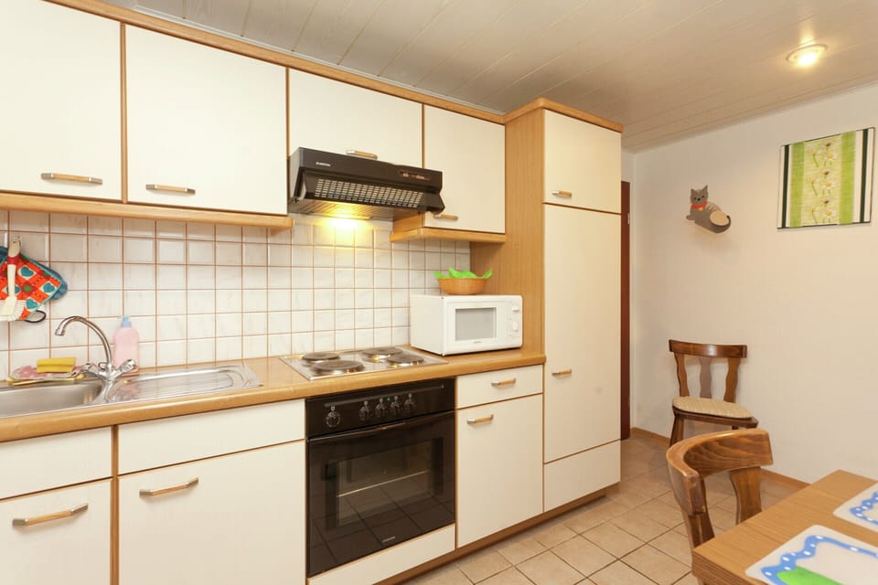 Apartment | Private kitchen | Highchair, cookware/dishes/utensils
