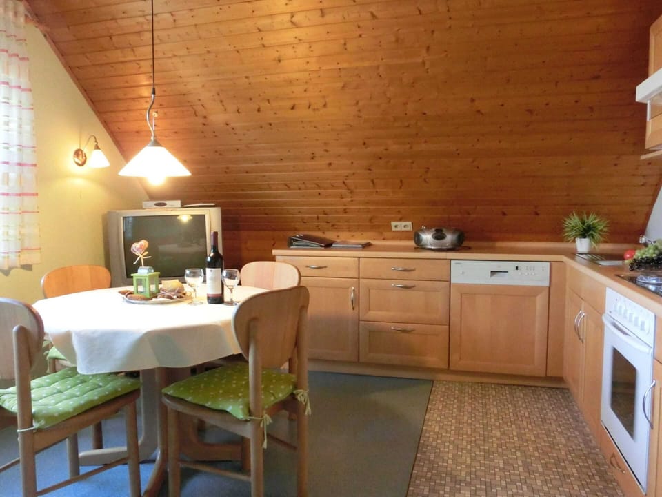 Apartment | Private kitchen | Microwave, stovetop, highchair, cookware/dishes/utensils