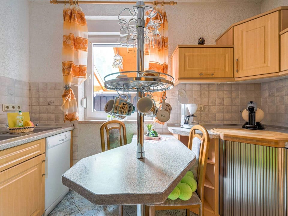 Apartment | Private kitchen | Stovetop, coffee/tea maker, highchair