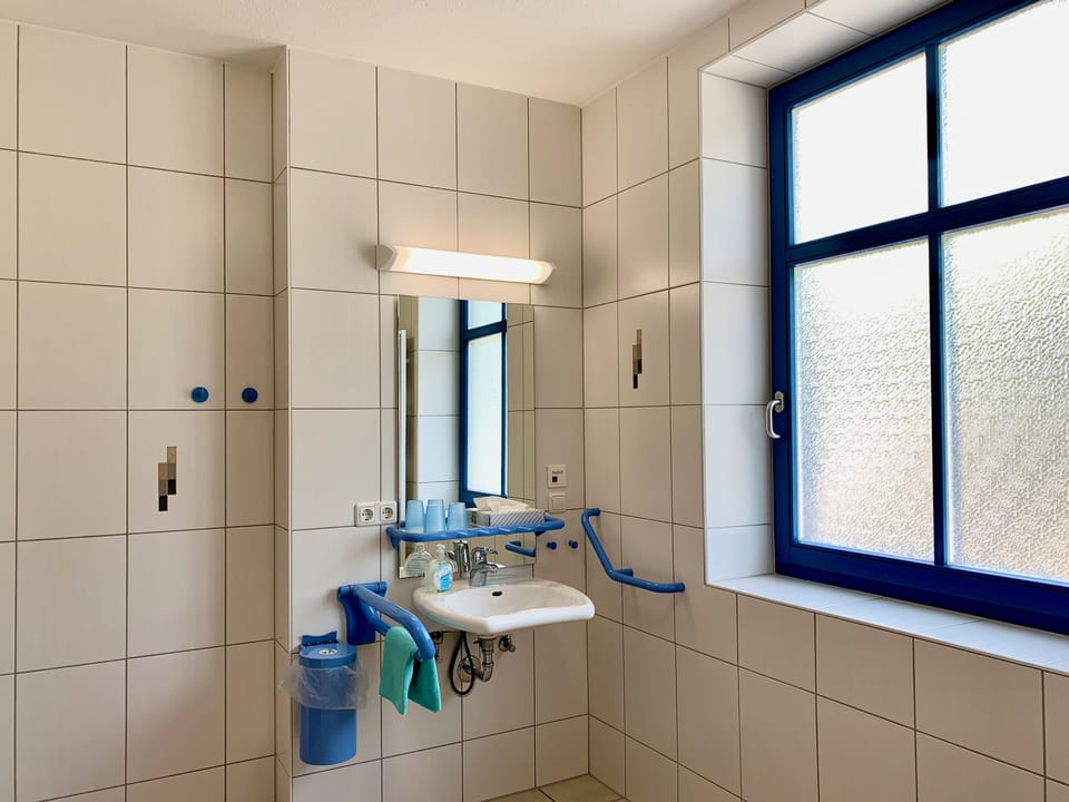 Shower, towels, soap, shampoo