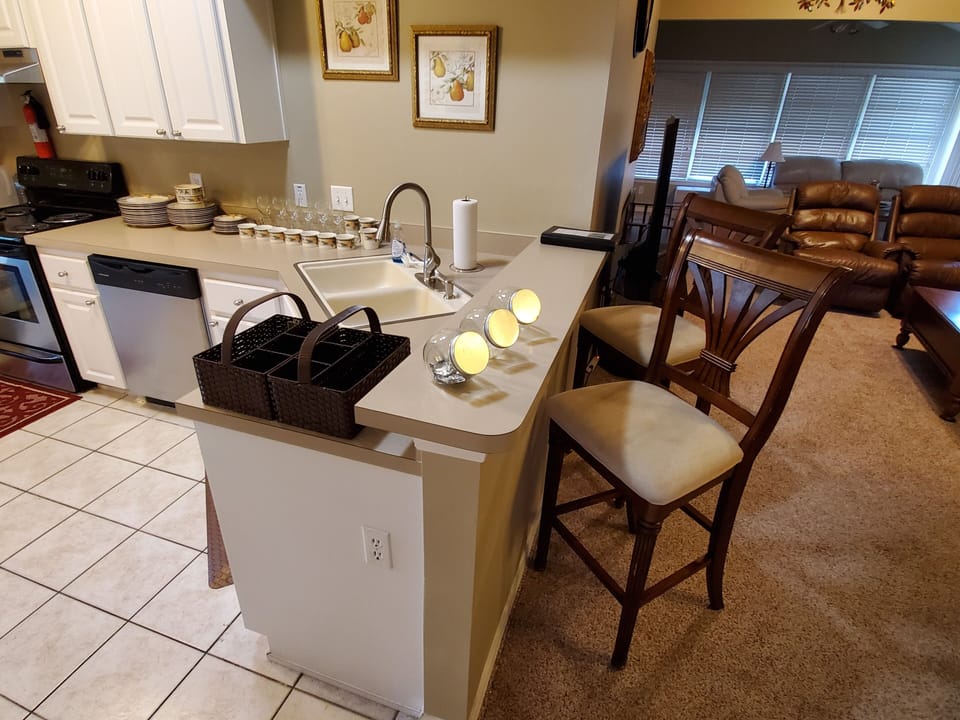 Eating at the bar is fast and convenient with 4 high boy chairs total