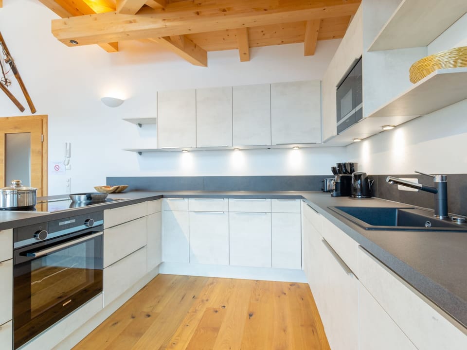 Chalet | Private kitchen | Electric kettle, highchair, cookware/dishes/utensils, dining tables