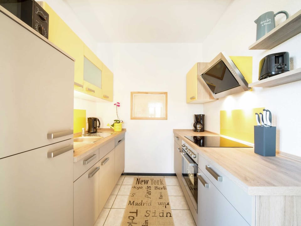 Apartment | Private kitchen | Stovetop, highchair