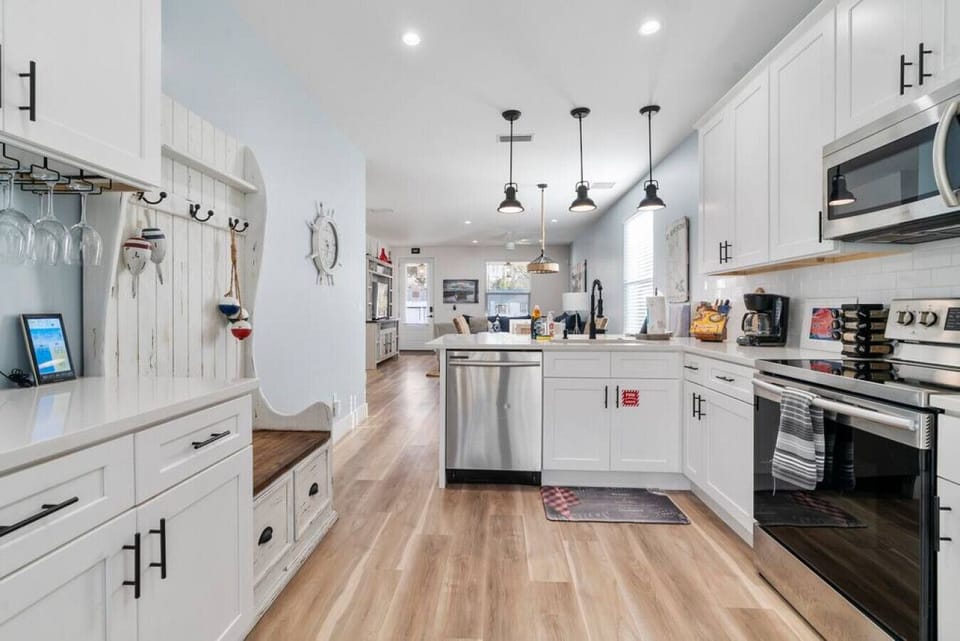 Wonderful well stocked kitchen and wide open spaces full of natural light. Such a great flow to this home.