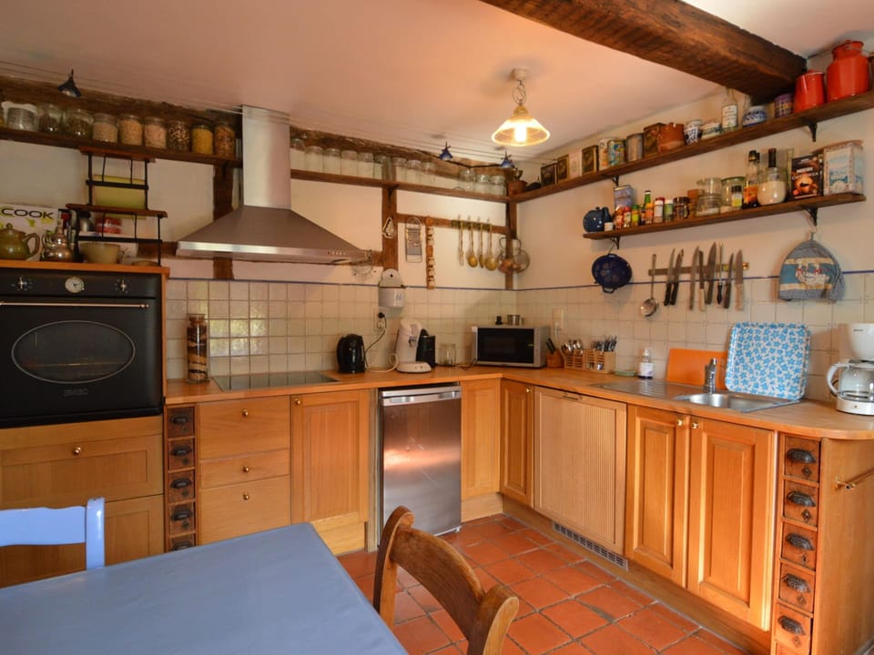 Cottage | Private kitchen | Fridge, highchair