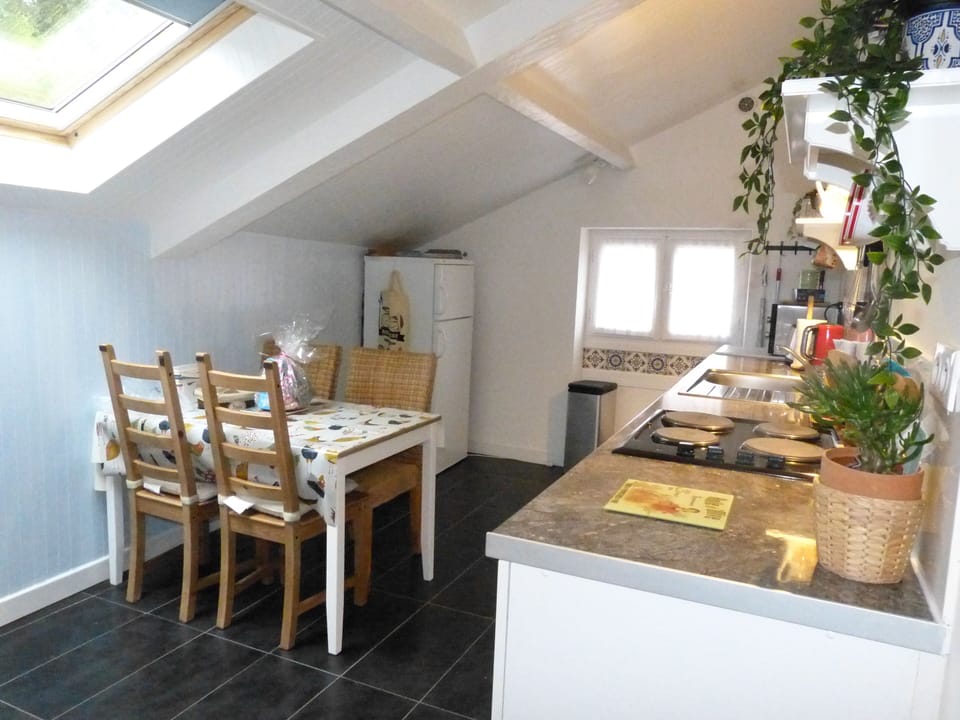 The dining kitchen has a table and chairs for up to four people 