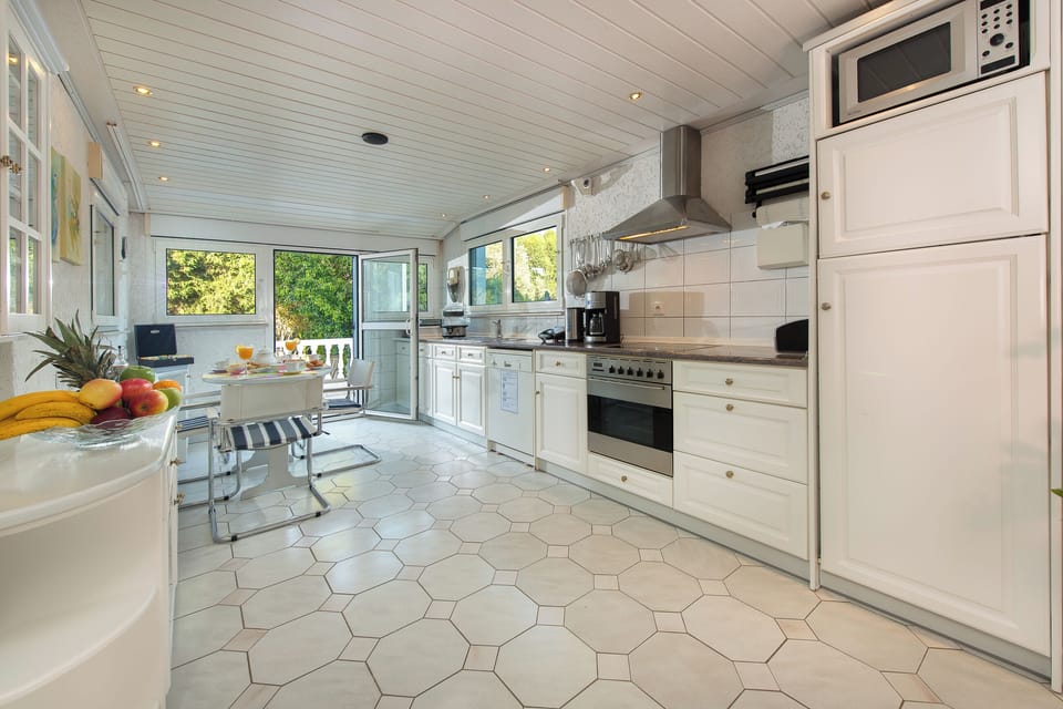 Sunshine kitchen area full equipped with dining area . Dishwasher available. 