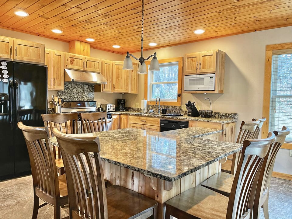 Our warm, welcoming kitchen is fully equipped with appliances and cooking tools.