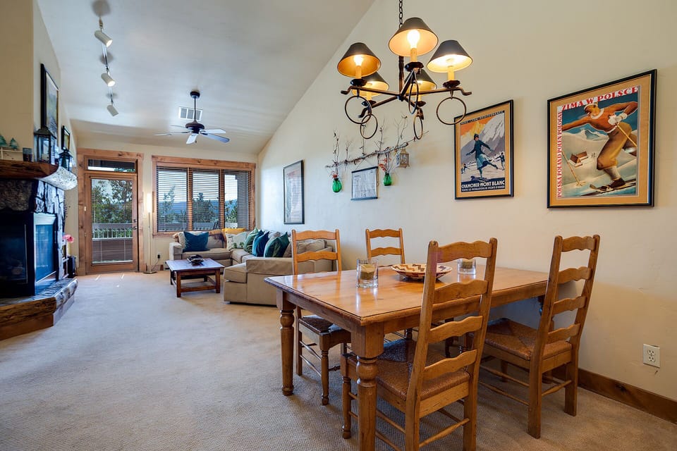 Gather around your warm dining table while natural light streams through sliding doors to your private balcony.