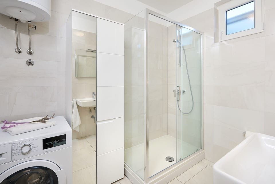 Bathroom with washing machine