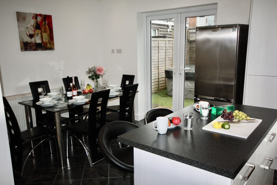 Open plan kitchen and dinner leading to the garden