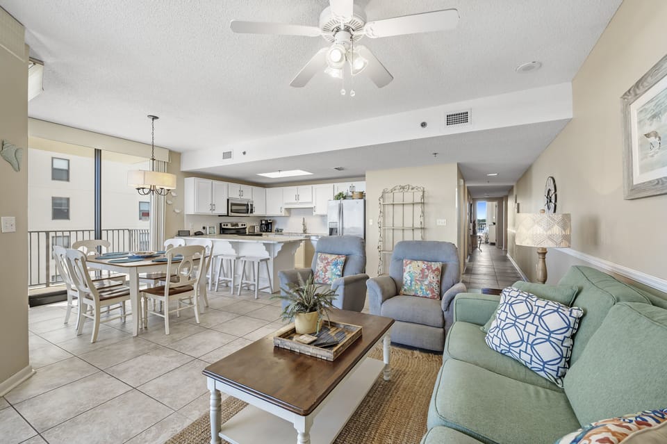 Spacious Living Area with a Queen Size Sleeper Sofa and access to Private Balcony