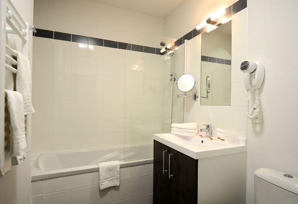 Freshen up in the bathroom after a day of adventure.
