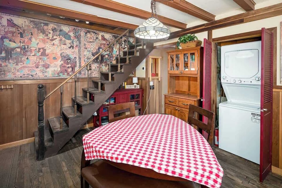 Kitchen and Laundry Area plus stairs to Master Bedroom 