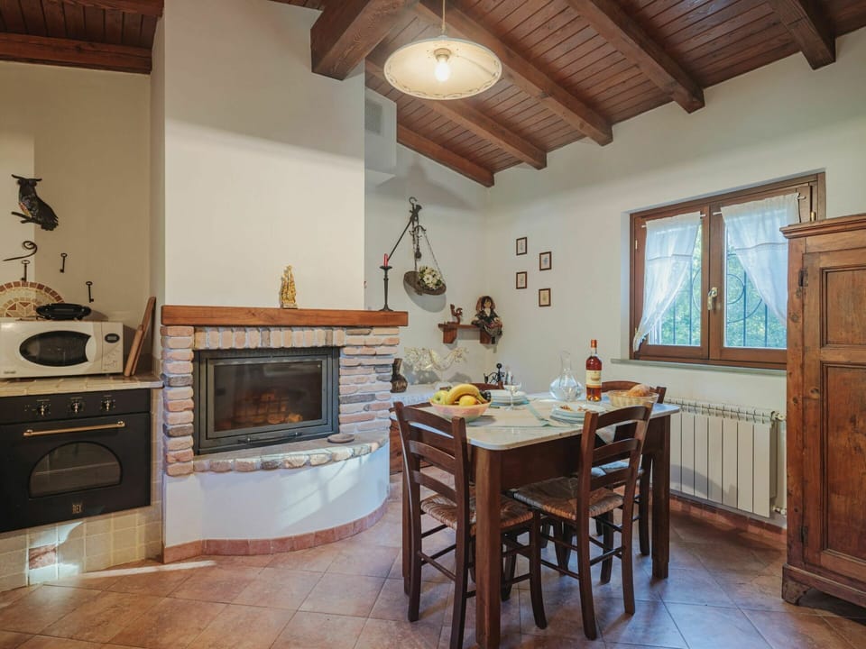 Furniture, Property, Table, Wood, Cabinetry, Interior Design, Chair, Wood Stain, Stove, Flooring