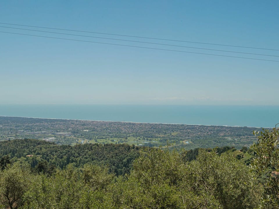 Sky, Plant Community, Ecoregion, Cloud, Natural Landscape, Biome, Overhead Power Line, Horizon, Plain, Mountainous Landforms