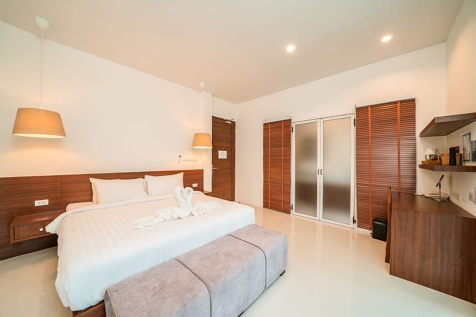 Deluxe Pool Villa | Free minibar items, in-room safe, desk, blackout drapes