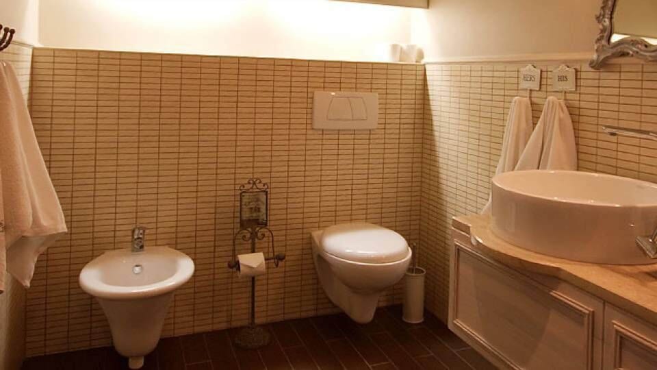 Shower, designer toiletries, hair dryer, bathrobes