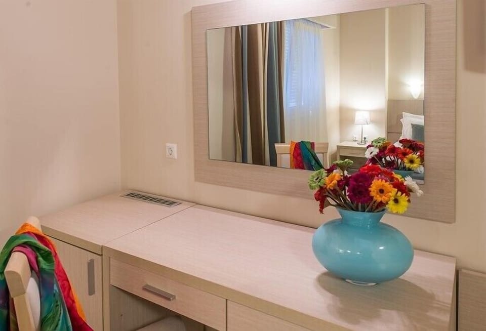 Standard Double Room, Garden View (No balcony) | Living area | 26-inch flat-screen TV with satellite channels, TV