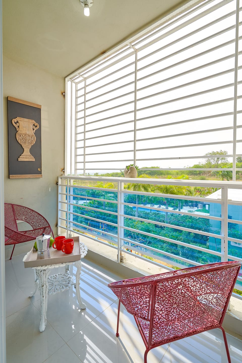 Enjoy a fresh breeze in the Balcony facing the recreational area