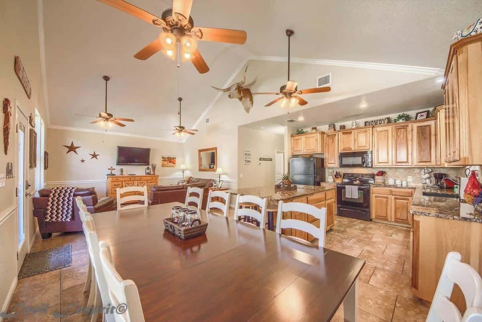 Open kitchen/dining and living area with many extra amenities.
