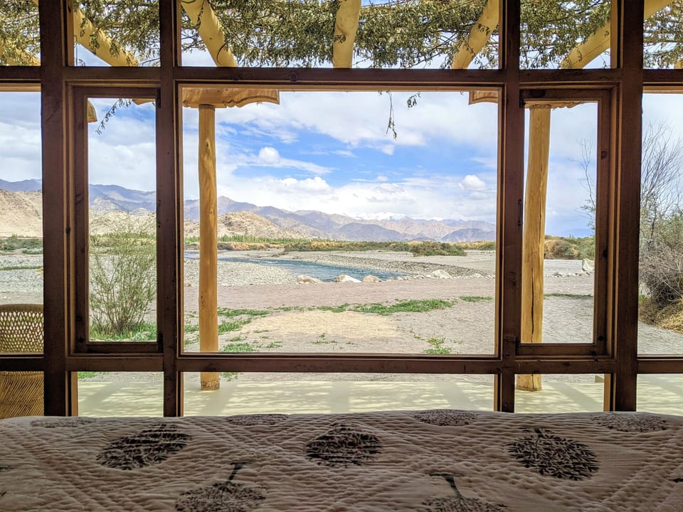 Riverside Chalet | Laptop workspace, blackout drapes, soundproofing, individually furnished