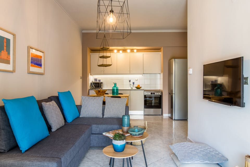Apartment, 1 Bedroom | Living room | Flat-screen TV