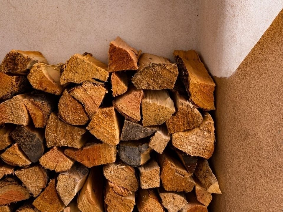 Firewood stacked at your door in season