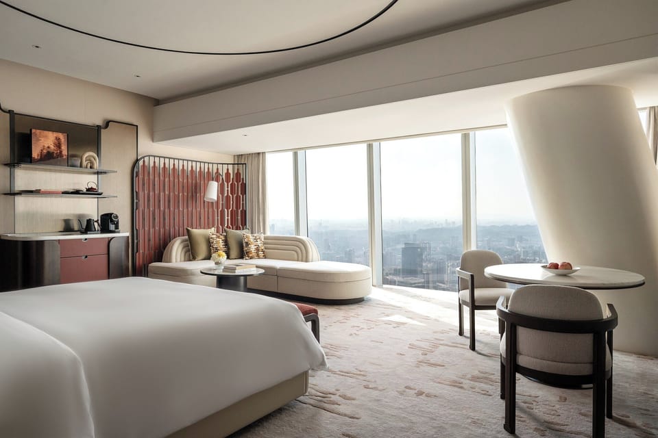Premium bedding, down comforters, minibar, in-room safe