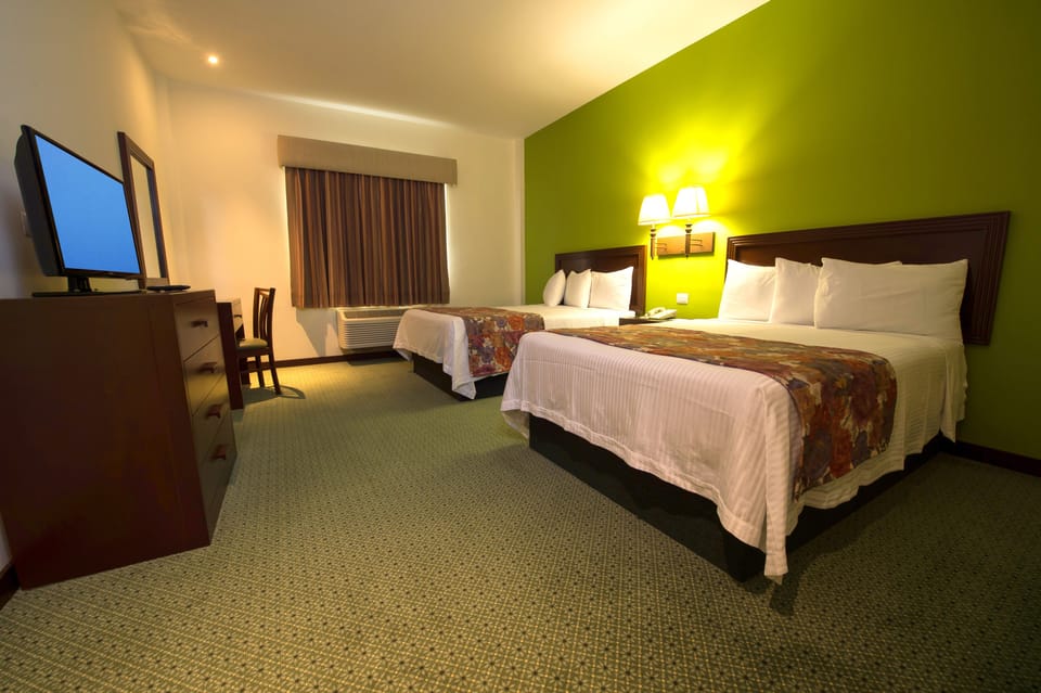 Standard Double Room | Desk, blackout drapes, iron/ironing board, bed sheets