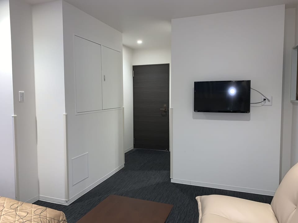Triple Room, Non Smoking (25 sqm, No Elevator Access) | Desk, blackout drapes, soundproofing, iron/ironing board
