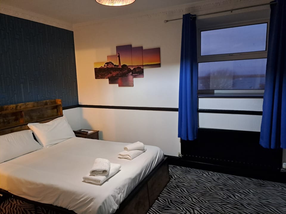 Family Triple Room | Desk, iron/ironing board, free WiFi, bed sheets