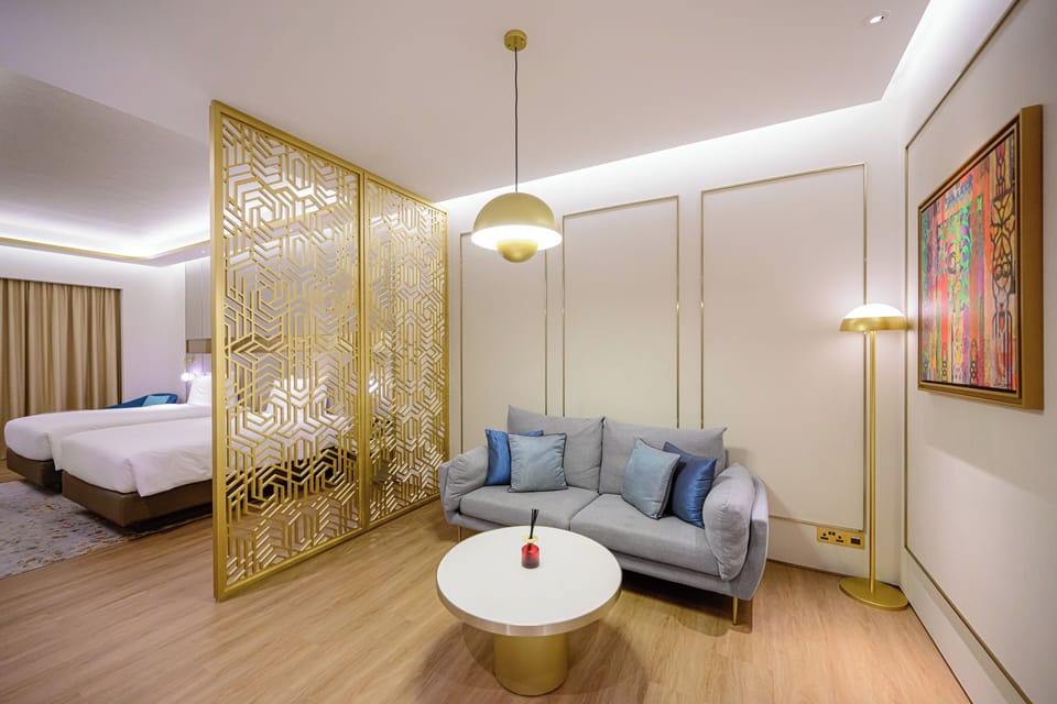 Deluxe Suite (Subject to 2 Double Beds or 1 KingBed) | Living area | LCD TV