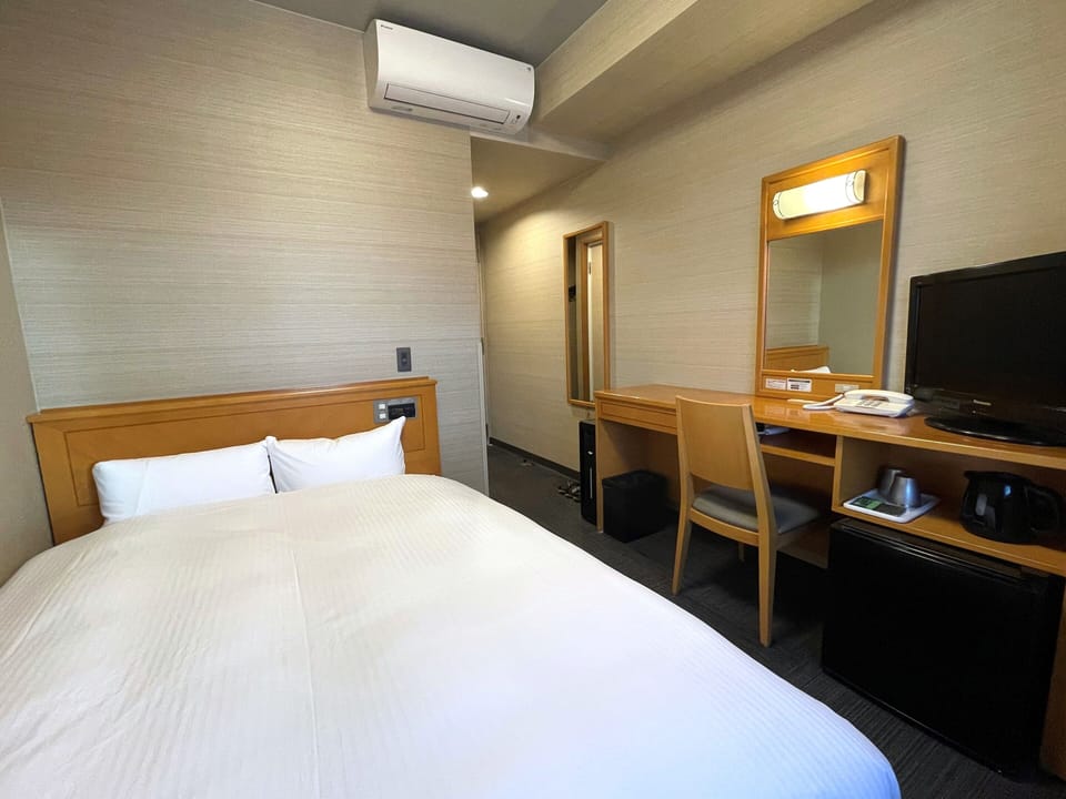 Desk, WiFi (free), bed sheets