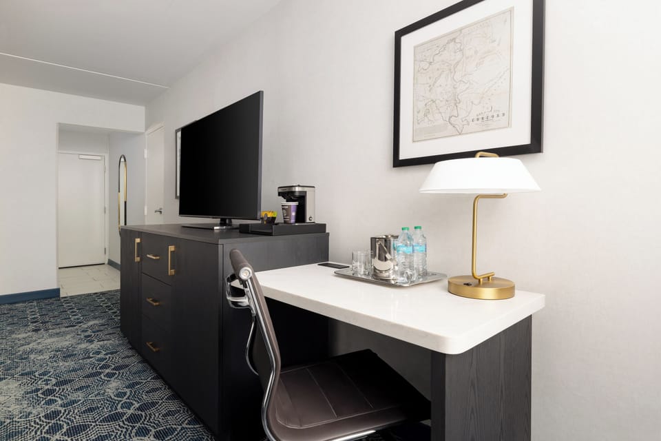 Down comforters, pillowtop beds, desk, laptop workspace
