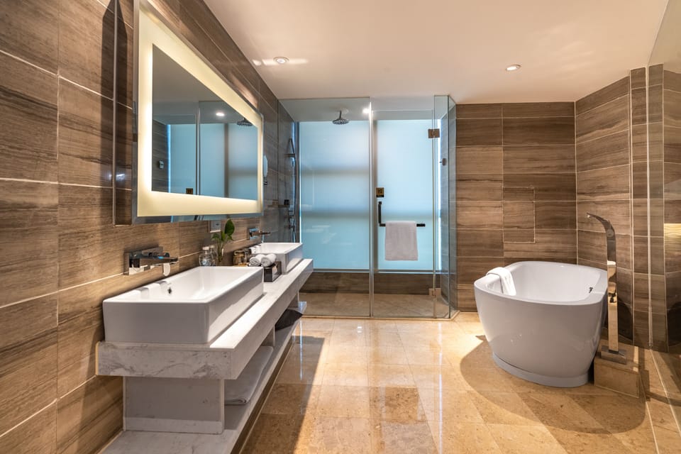 Rainfall showerhead, eco-friendly toiletries, bathrobes, slippers