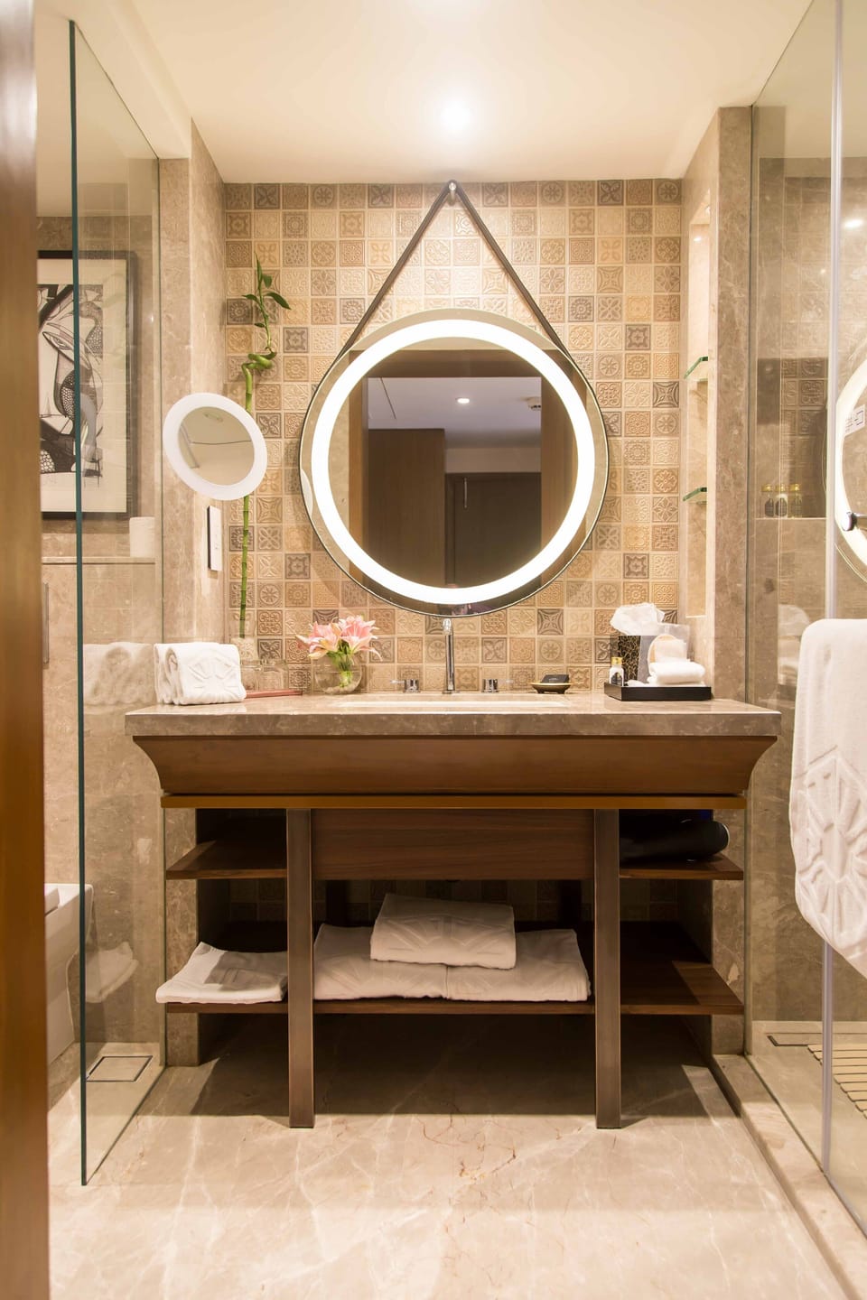 Shower, designer toiletries, hair dryer, bathrobes