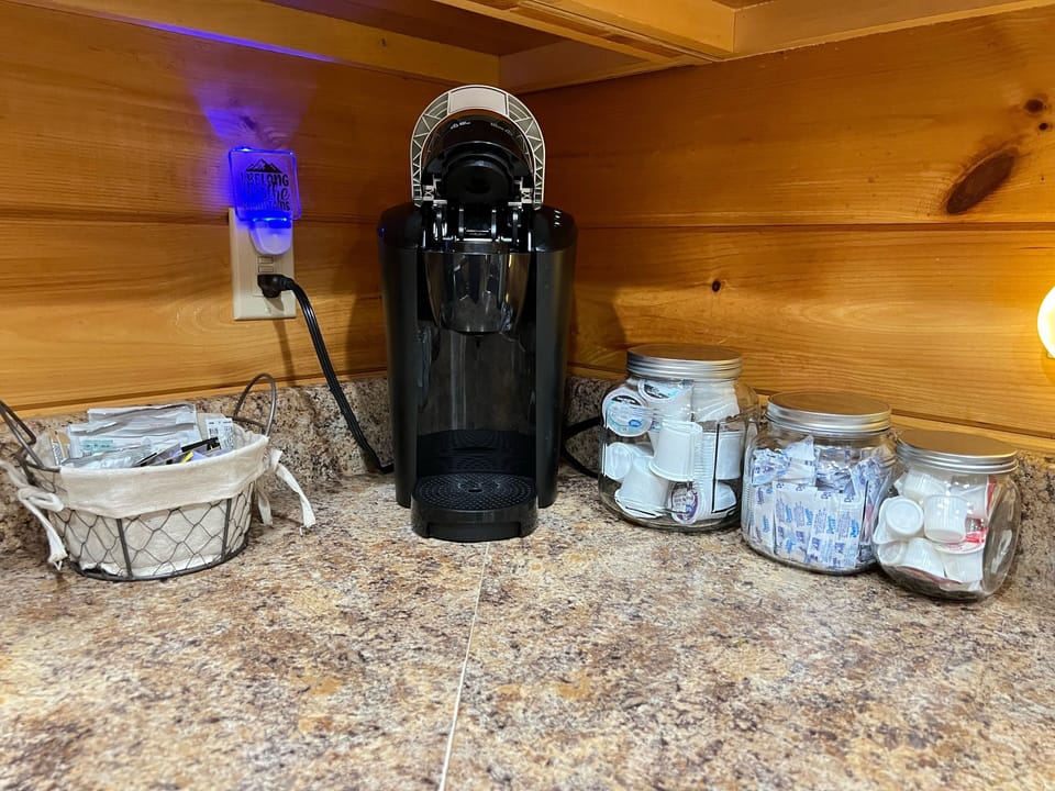 K cup coffee maker, k-cups, sugar, creamer provided ( limited quantities)