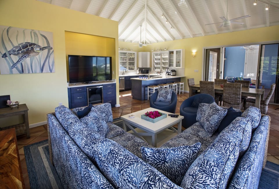 The spacious and comfy living room with AC, flat screen TV and 1/2 bath.